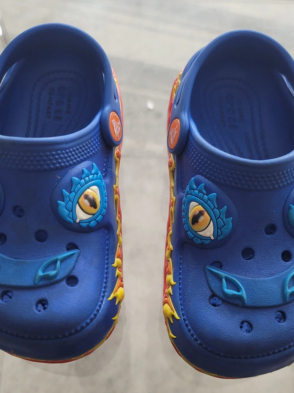 CROCS Kids Blue Dragon Clogs with Red/Yellow Flame Trim